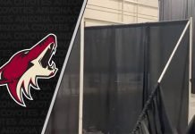 Picture of man working on Mullett Arena visitor dressing room
