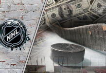 Picture of a hockey stick and a puck with money in the background.
