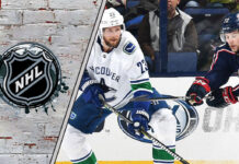 Picture of Vancouver Canucks player and Columbus BLue Jackets player. Will the teams make a blockbuster trade?