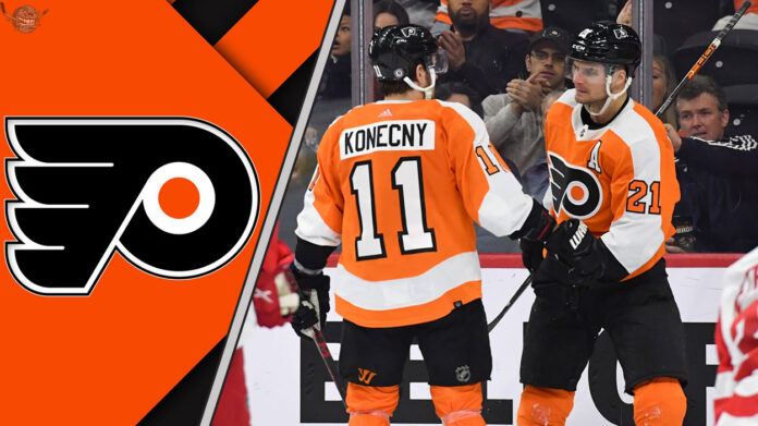 Picture of Travis Konecny and Scott Laughton celebrating a goal.