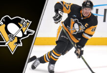 Photo of Sidney Crosby in Pittsburgh Penguins gear celebrating a goal, symbolizing his 2023 season's success and contribution to team's NHL ranking.