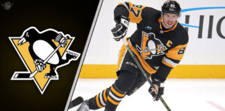 Photo of Sidney Crosby in Pittsburgh Penguins gear celebrating a goal, symbolizing his 2023 season's success and contribution to team's NHL ranking.