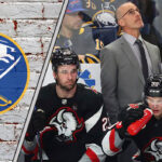Will the Buffalo Sabres Consider Coaching Change Amid Struggles? Buffalo Sabres coach Don Granato contemplating during a challenging game, reflecting team’s performance issues.