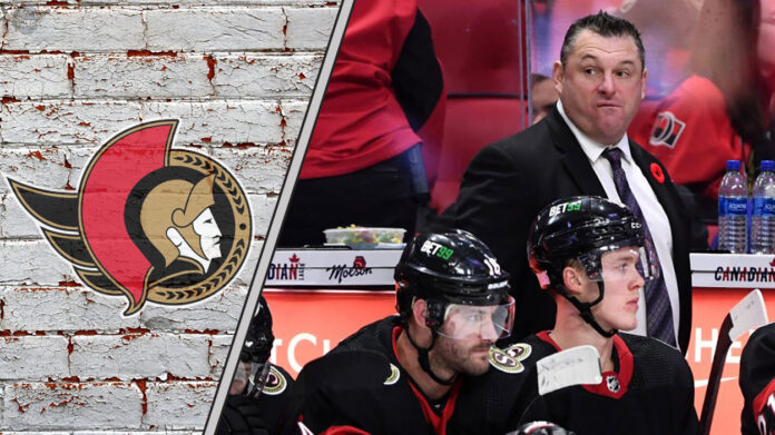 Ottawa Senators head coach D.J. Smith contemplating during a game