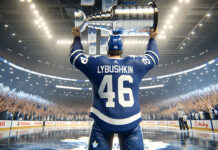 Toronto Maple Leafs Ilya Lyubushkin in blue and white jersey