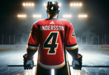 Rasmus Andersson in Calgary Flames jersey looking determined on the ice