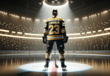 Elias Lindholm in a Boston Bruins jersey skates on the ice.