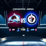 Closeup of the Colorado Avalanche and Winnipeg Jets logos on an NHL scoreboard