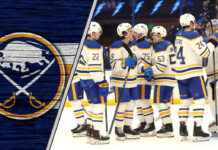 Buffalo Sabres players celebrating a team win over the Tampa Bay Lightning
