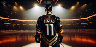 Trevor Zegras, Anaheim Ducks, looks on in frustration.