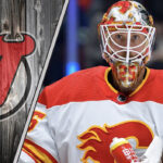 Calgary Flames’ Jacob Markstrom Trade Rumors Heat Up After Exit Interview Close-up photo of Jacob Markstrom in a Calgary Flames jersey making a save.