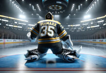 Linus Ullmark flashes the glove for a highlight-reel save in a Boston Bruins jersey