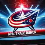 Columbus Blue Jackets Trade Rumors: Patrik Laine on the Block? Picture of the Columbus Blue Jackets logo with a hockey arena in the background and the words NHL trade rumor below the logo