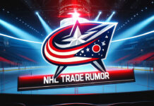 Picture of the Columbus Blue Jackets logo with a hockey arena in the background and the words NHL trade rumor below the logo