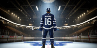 Toronto Maple Leafs winger Mitch Marner skates with the puck
