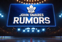 Toronto Maple Leafs logo with the words John Tavares rumors below the logo