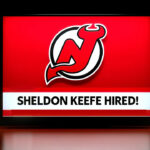 New Jersey Devils Hire Sheldon Keefe as Head Coach New Jersey Devils logo with the words Sheldon Keefe hired below the logo