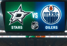 Dallas Stars and Edmonton Oilers logo on an NHL scoreboard with the word vs. between the logos