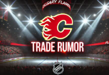 Vibrant NHL arena with spotlights and cheering fans with the Calgary Flames logo and the words trade rumor below the logo