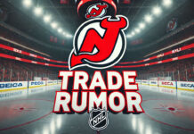 New Jersey Devils logo with the words trade rumor below the logo with the background of an NHL rink