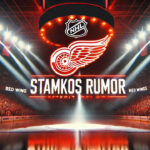 Detroit Red Wings logo with the words Stamkos rumors below the logo with the background on an NHL arena