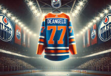 Tony DeAngelo Edmonton oilers jersey hanging from the rafters of the Oilers arena.