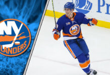 Brock Nelson in an Islanders jersey, skating with the puck.