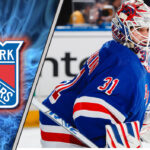 Igor Shesterkin & NY Rangers: Will a Contract Extension Happen? Igor Shesterkin in New York Rangers jersey, looking pensive during a game.