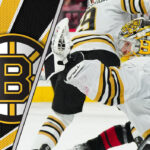Jeremy Swayman Trade Rumors: Bruins at a Crossroads Jeremy Swayman, Boston Bruins goalie, stands tall in net during an NHL game.