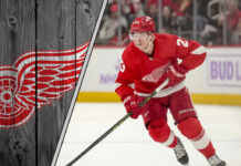 Lucas Raymond of the Detroit Red Wings skating with the puck