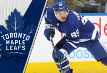 Nick Robertson in a Toronto Maple Leafs jersey looking pensive