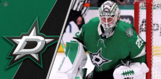Jake Oettinger making a save in a Dallas Stars uniform.