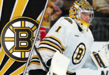 Jeremy Swayman smiles in his Boston Bruins uniform.