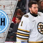 Jeremy Swayman in Boston Bruins uniform making a save.