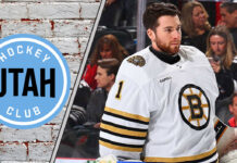 Jeremy Swayman in Boston Bruins uniform making a save.