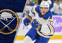 Brenden Dillon checks JJ Peterka in NHL Global Series game.
