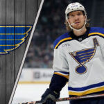 St. Louis Blues center Robert Thomas grimaces in pain after blocking a shot.