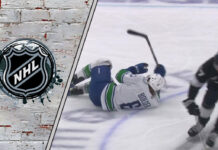 Tanner Jeannot checks Brock Boeser in the neutral zone.