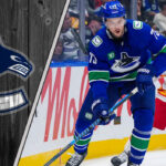 Vancouver Canucks defenseman Vincent Desharnais skating with the puck.