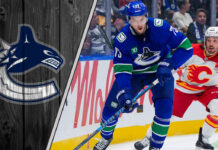 Vancouver Canucks defenseman Vincent Desharnais skating with the puck.