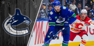 Vancouver Canucks defenseman Vincent Desharnais skating with the puck.