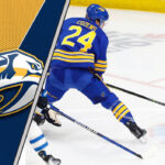 Dylan Cozens of the Buffalo Sabres skates with the puck.