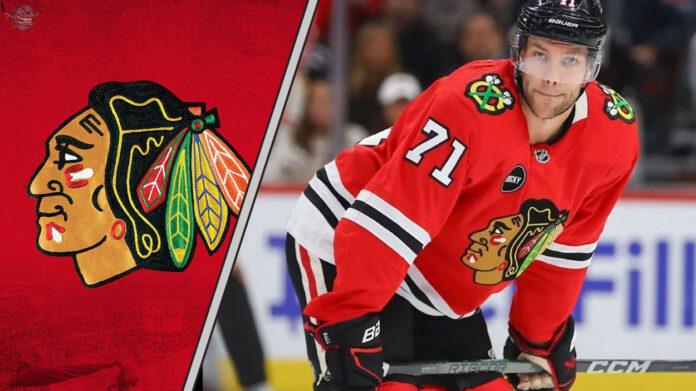 Chicago Blackhawks Rumors: Taylor Hall Eyeing Stanley Cup Contender Taylor Hall in Chicago Blackhawks jersey looking determined