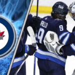 Winnipeg Jets Stanley Cup Odds & Predictions (2025) Winnipeg Jets players celebrating a victory on the ice.