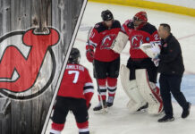 Devils goalie Jacob Markstrom injured clutching his knee