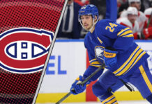 Dylan Cozens in action during an NHL game.