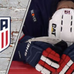 Tkachuk’s Status in Doubt: 4 Nations Face-Off Tournament on Edge Matthew Tkachuk having his head down on the Team USA bench in pain from groin injury.