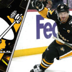 Sidney Crosby celebrating his record-breaking 20th consecutive point-per-game season in the NHL.