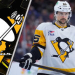 Erik Karlsson on the ice during an NHL game, wearing a Pittsburgh Penguins jersey