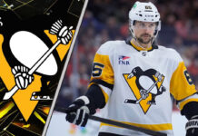 Erik Karlsson on the ice during an NHL game, wearing a Pittsburgh Penguins jersey